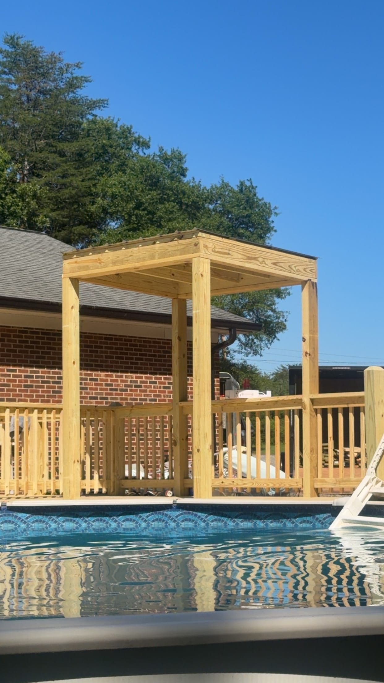 Custom deck and outdoor living space built by AGCS
